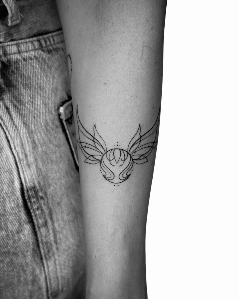 tatuagem harry potter pomo de ouro